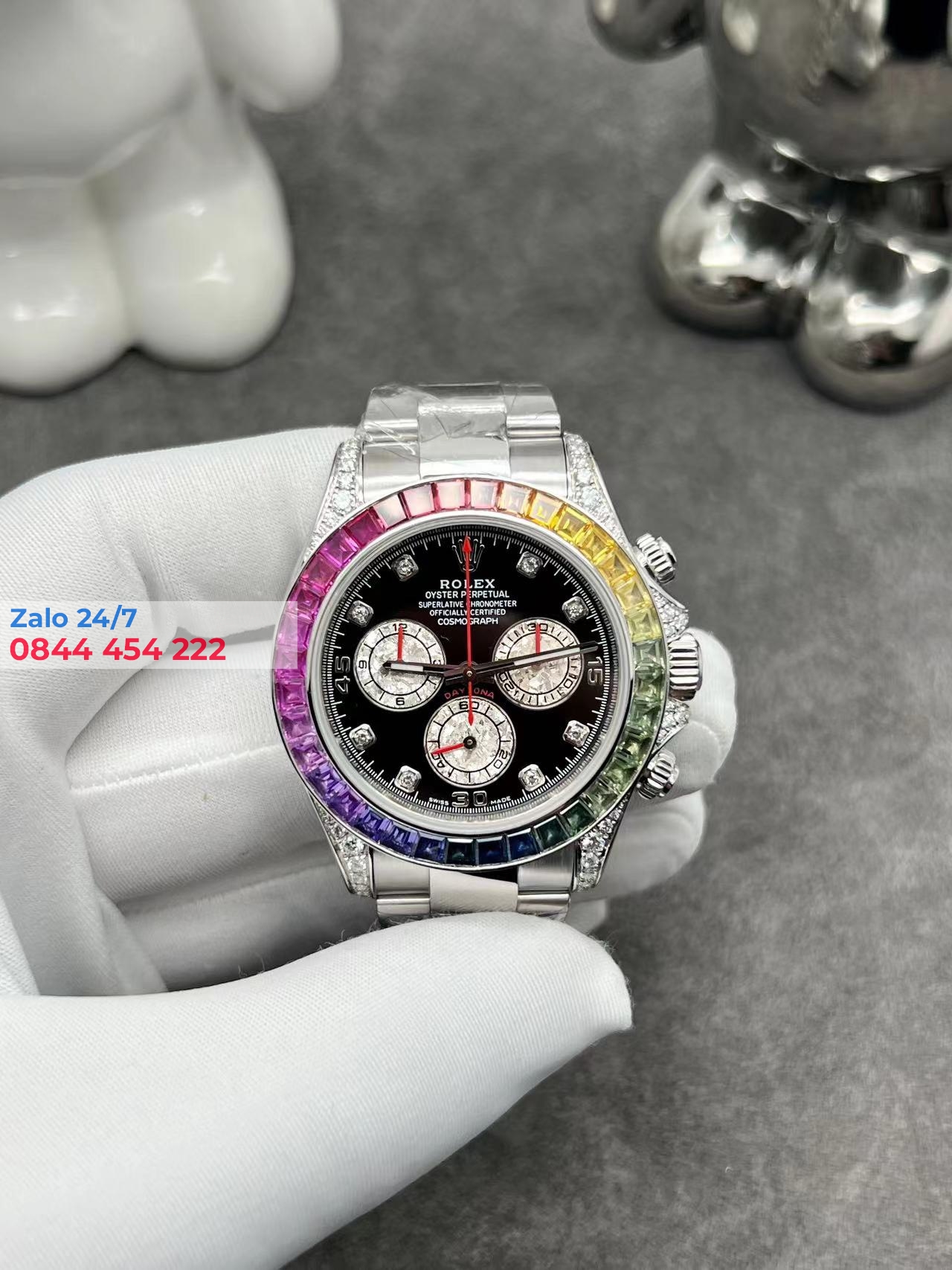 Đồng Hồ Rolex Cosmograph Daytona 116599 Mặt Số Đen Cọc Số Kim Cương Chế Tác Vàng Trắng Nguyên Khối 18k 